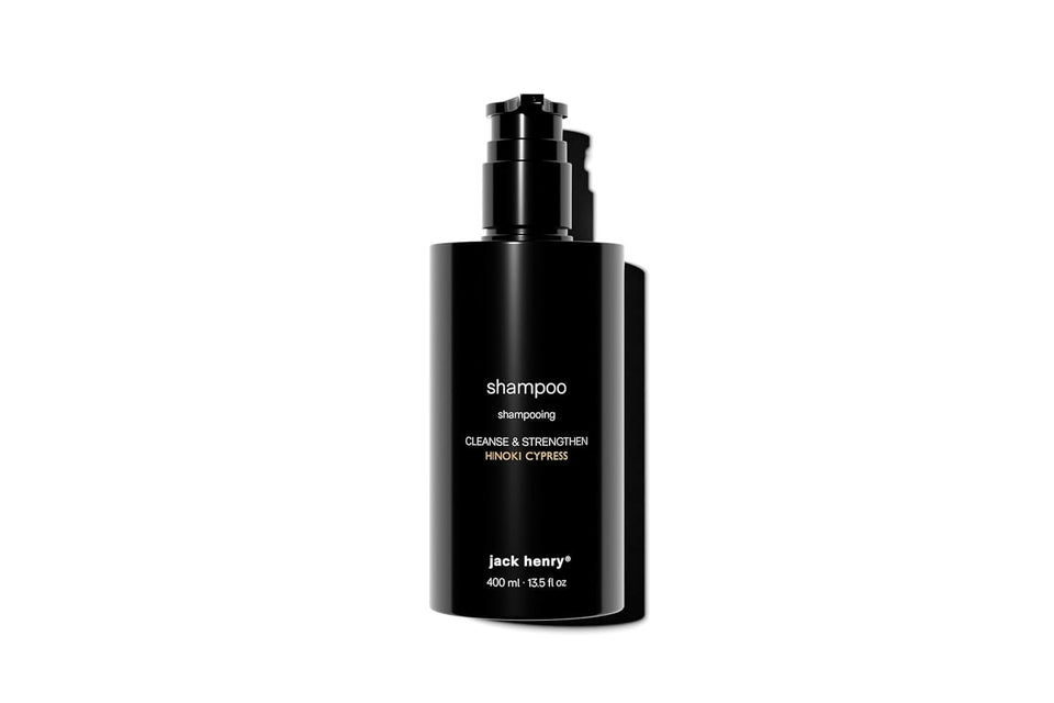 Jack Henry Creamy Shampoo bottle showcasing supergreens for natural nourishment and clean feel.