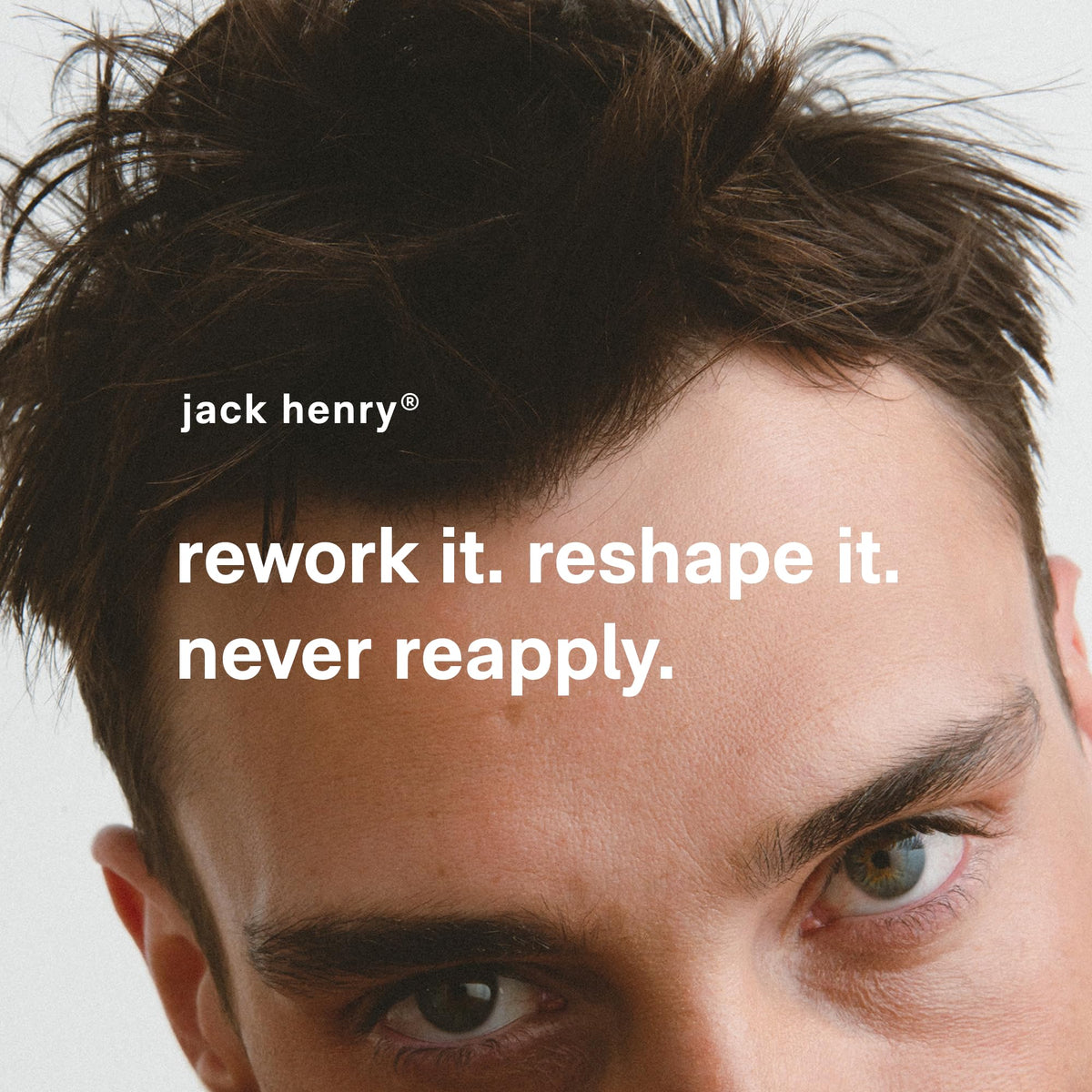 Applying Jack Henry Hair Paste to hair to create texture and shape
