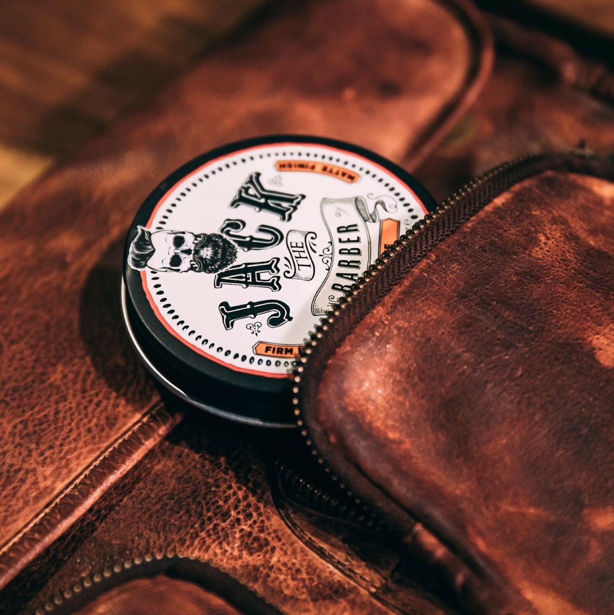 Jack The Barber hair clay tin packaging on a clean surface