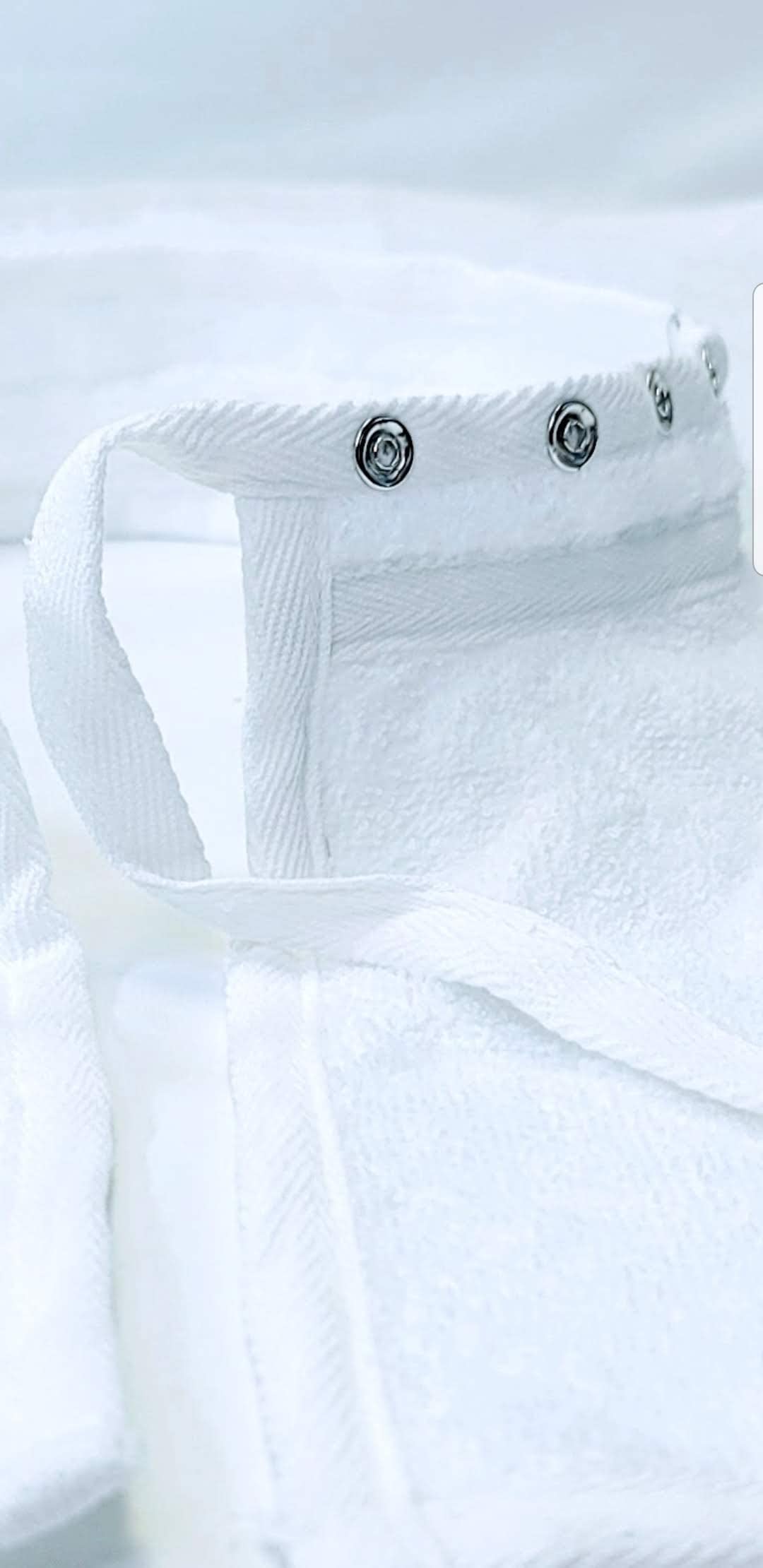 JADASH towel with inner collar stays in place during treatments
