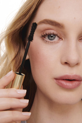 Jane Iredale Beyond Lash Mascara on inner and outer corners offers lift.