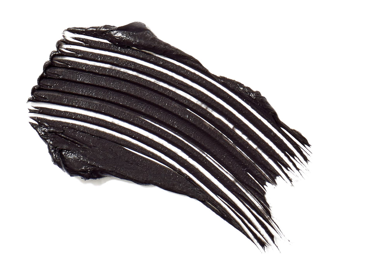 Jane Iredale Beyond Lash Mascara tube close-up shows rich black color and lasting payoff.