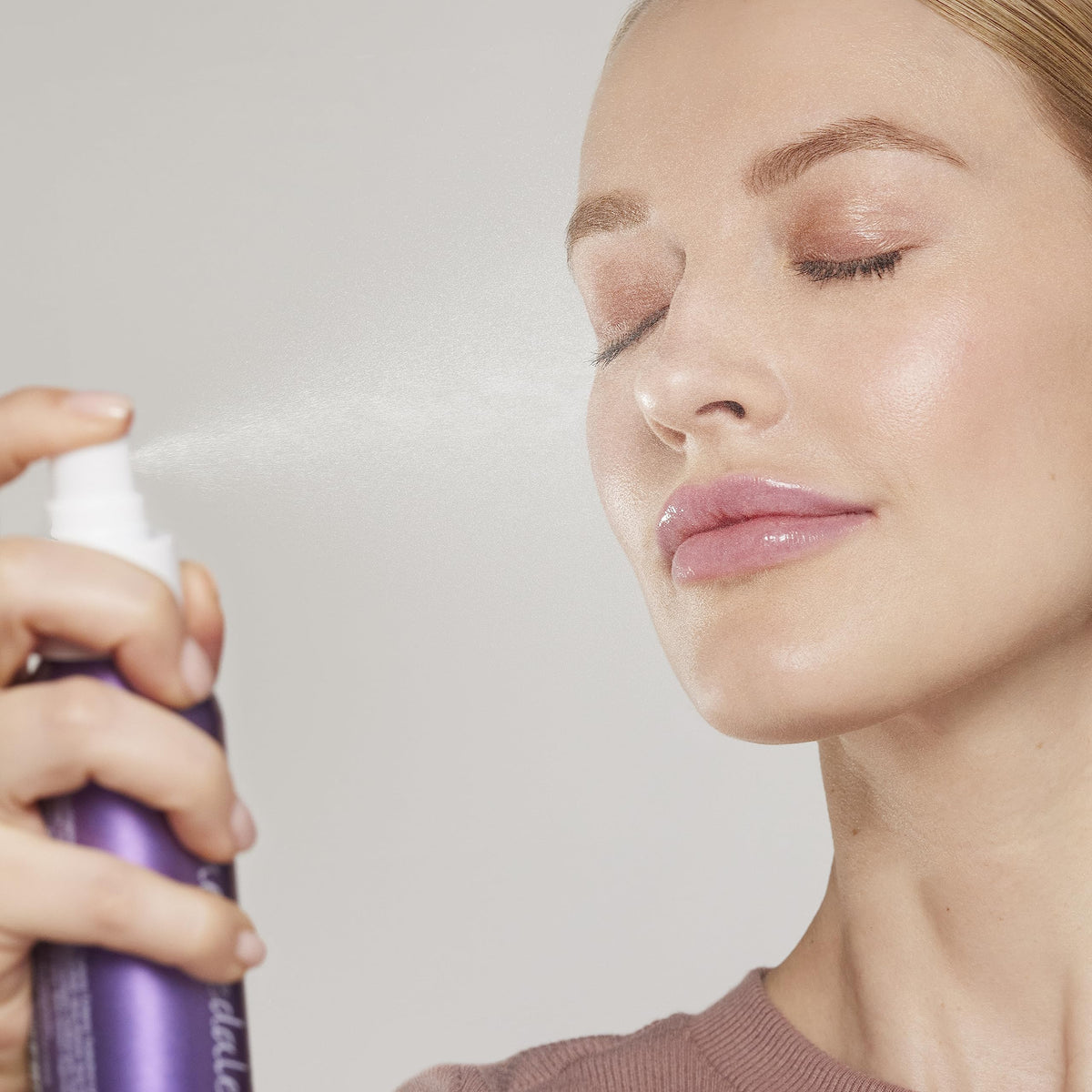 Jane Iredale Lavender Calming Hydration Spray on face reduces irritation and provides moisture