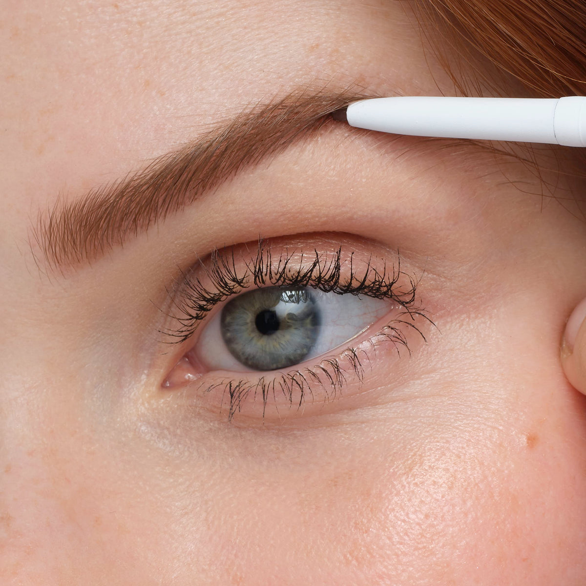 Packaging for Jane Iredale PureBrow Precision Pencil with retractable design.