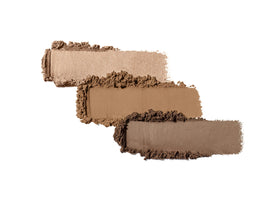 jane iredale PurePressed Eye Shadow Triple Cognac swatches displaying warm neutrals for soft blends.
