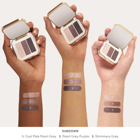 Jane Iredale PurePressed Eye Shadow Triple Sundown being applied with a brush for smooth blending.