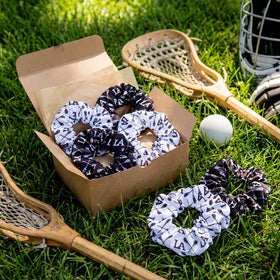 Janinka lacrosse scrunchie on a ponytail with sporty flair