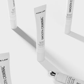 JAXON LANE eye-cream packaging shown for daily use routine.