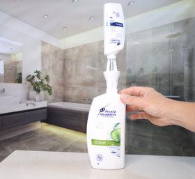 JCK Every Drop transfer-cap in action for quick mess-free bottle-to-bottle swaps