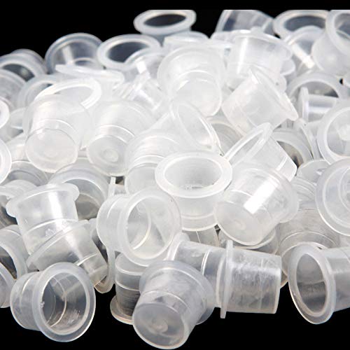 Jconly tattoo ink caps with visible measurement lines for precise ink blending.