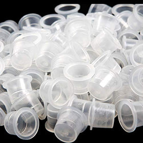 Jconly tattoo ink caps with visible measurement lines for precise ink blending.