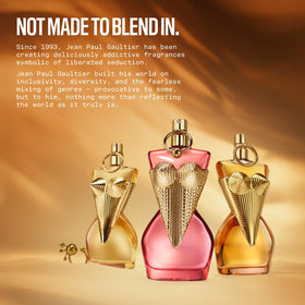 Amber glow liquid inside Divine Le Parfum Intense bottle