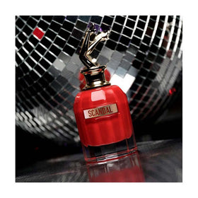 Jean Paul Gaultier Scandal Le Parfum 2.7 oz bottle highlights portable luxury.