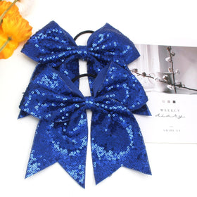 Jeffan jumbo blue sequin bow worn in hair for performances