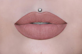 Swatches of Christmas Cookie reveal warm nude with gold pearl for all-day looks.