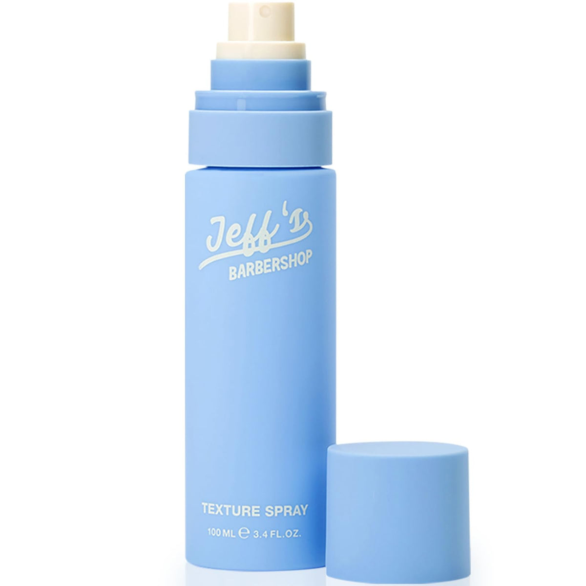 Jeff's Barbershop Sea Salt Texture Spray bottle demonstrates beachy texture with a matte finish.