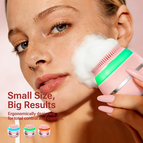 Jellystar electric face scrubber with pink LED screen shows mode.