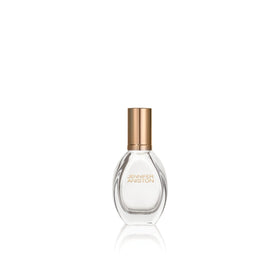 Jennifer Aniston Solstice Bloom bottle closeup reveals sunlit glow and elegant design