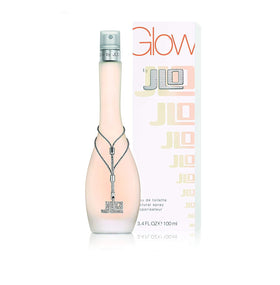 Jennifer Lopez Glow lifestyle image, perfume in hand for daily confidence.