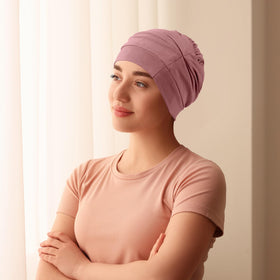 JenPen bonnet with elastic band delivers a secure, gentle hold.