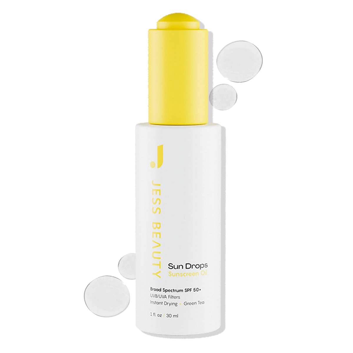 Jess Beauty Face Sunscreen Sun Drops SPF 50 bottle on vanity provides lightweight protection.