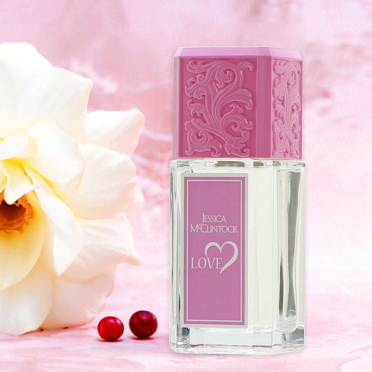 Jessica McClintock Love floral heart with gardenia and tuberose creates a romantic core