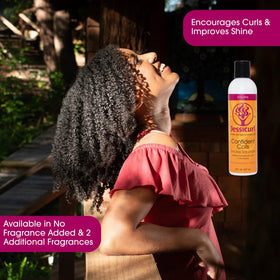 Defined curls after using Confident Coils, showcasing humidity protection and shine.