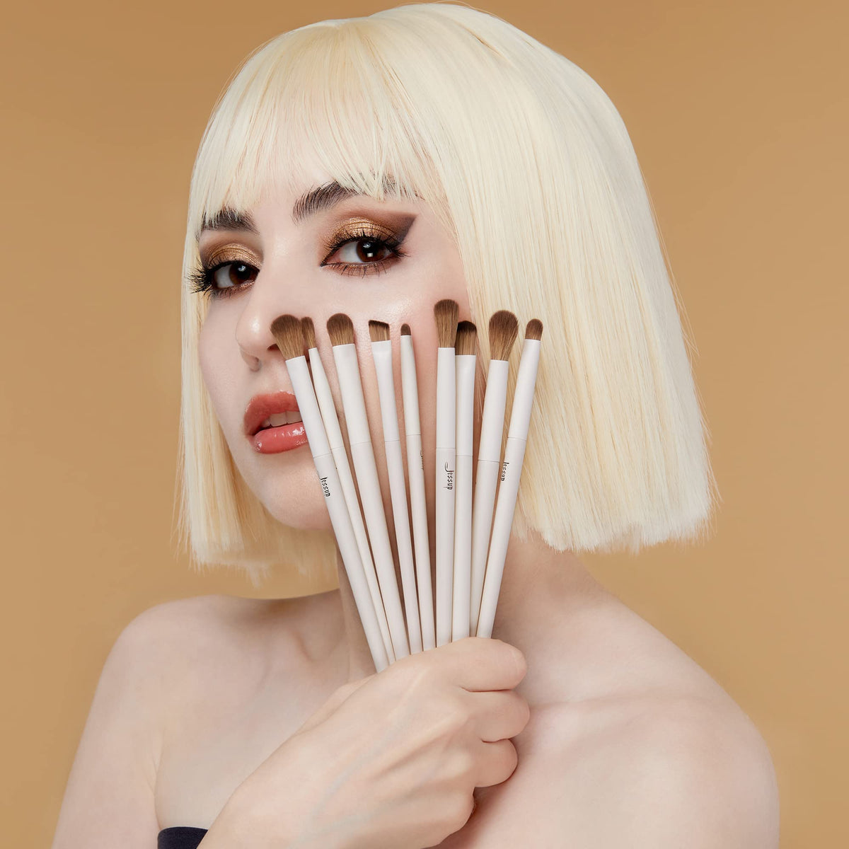 Jessup highlight brush adds targeted glow to eyes.
