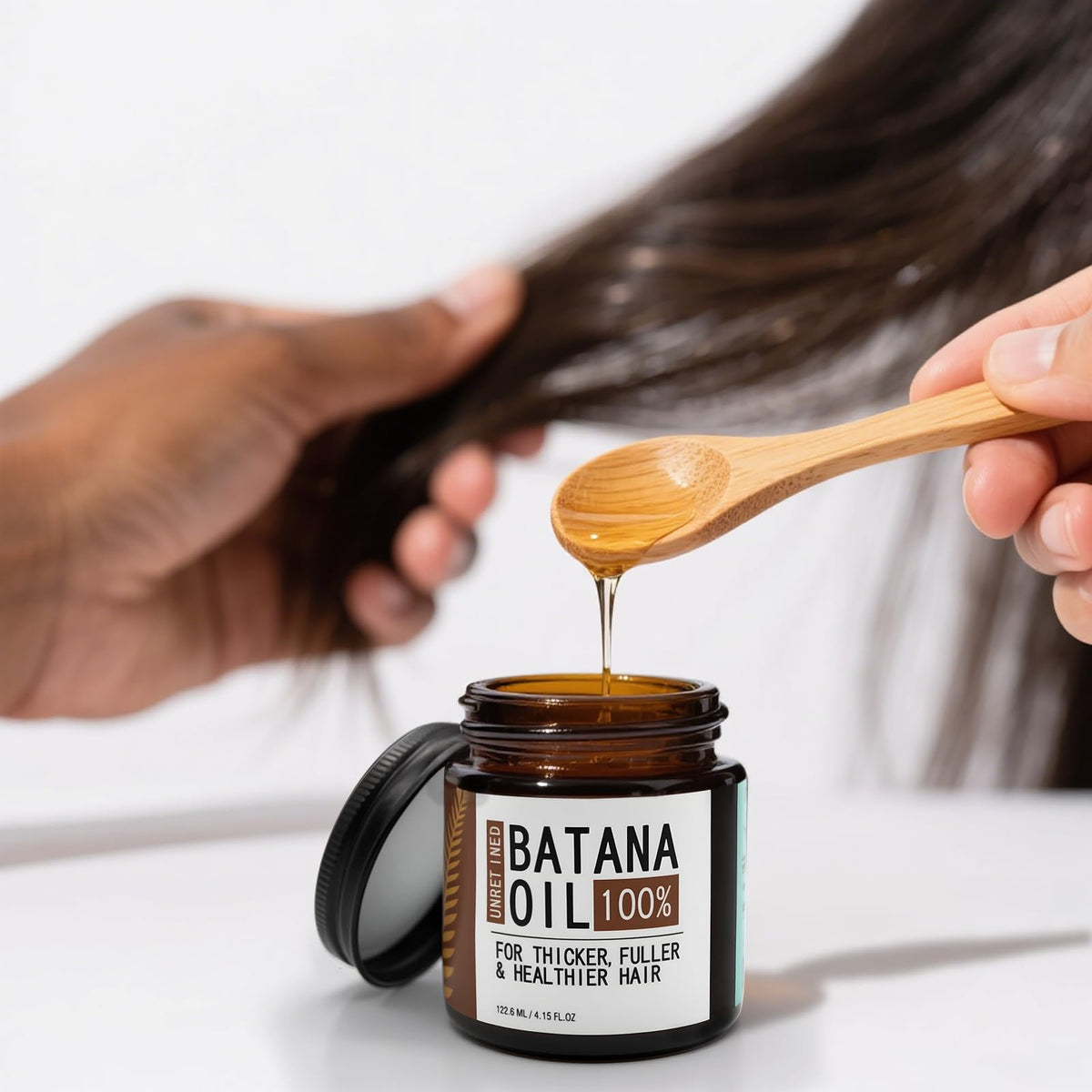Jiokiyo Batana oil on hair shows smooth texture and shine.
