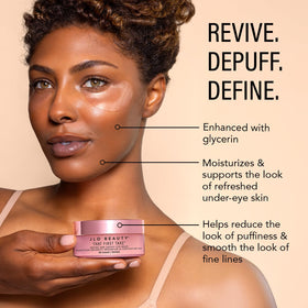 JLO Beauty hydrogel patches under-eye resting on skin for depuffing and brightness.