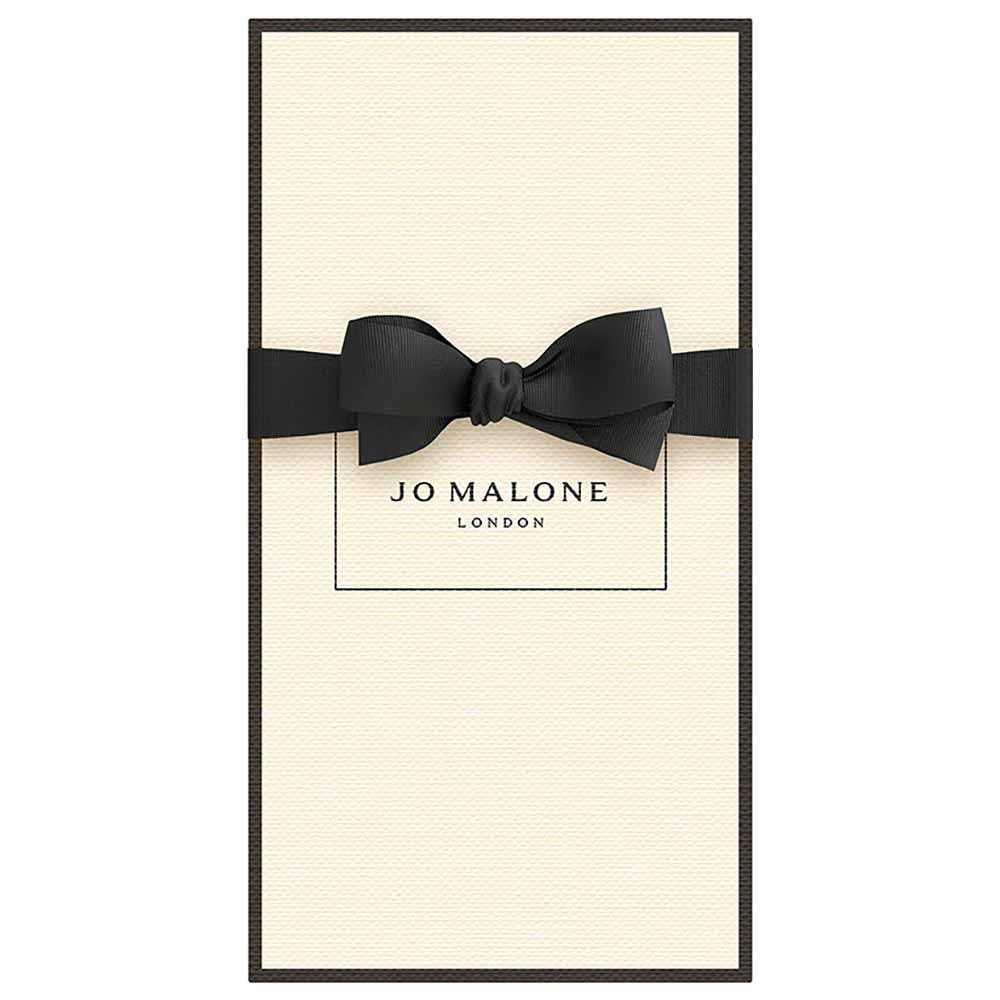 Jo Malone Lime Basil and Mandarin foamy lather showing vibrant citrus and herbal notes.