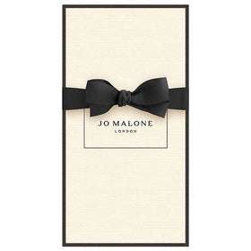 Jo Malone Lime Basil and Mandarin foamy lather showing vibrant citrus and herbal notes.