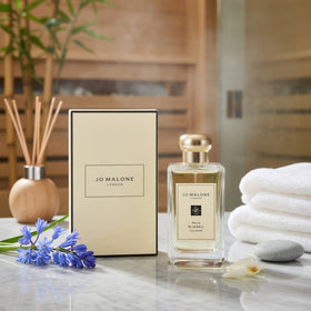 Jo Malone Wild Bluebell spray releasing a soft mist for everyday freshness.