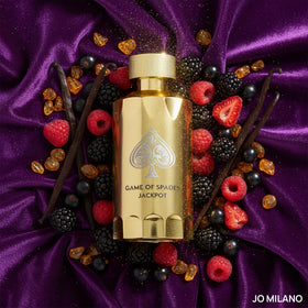 Jo Milano Game of Spades Jackpot bottle back, notes highlighted with citrus and vanilla, versatile daily wear.