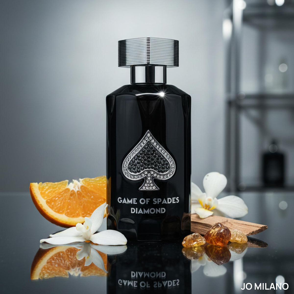 Jo Milano Game of Spades Diamond cap detail highlights luxury bottle design.