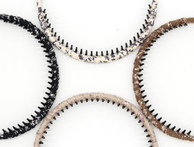 JOBAND headbands teeth-comb design aiding hair control during workouts