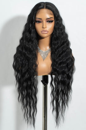 Joedir 30-inch long wavy lace-front wig for natural scalp appearance and versatile styling.