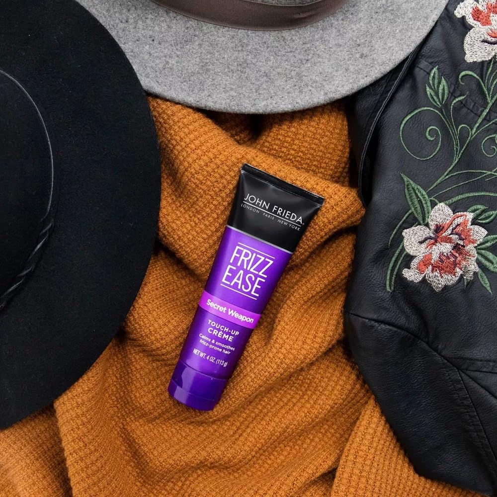 John Frieda Frizz Ease Secret Weapon creme applied to dry hair for smoothing