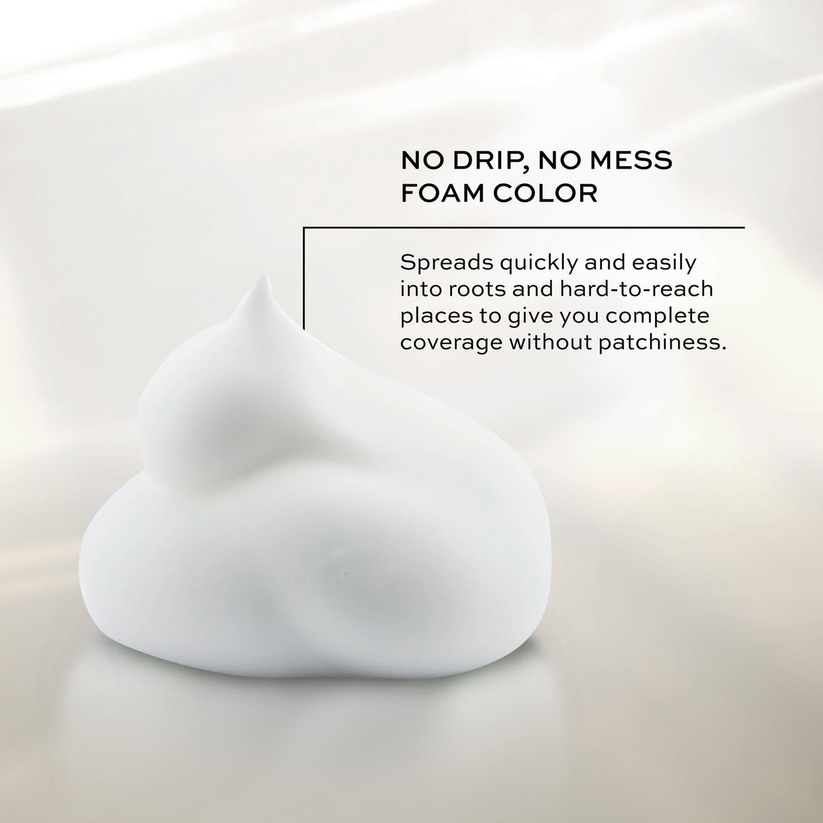 John Frieda Precision Foam application close-up shows patch-free coverage.