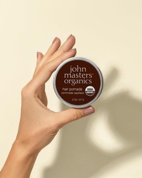 John Masters Organics Pomade with mango butter delivers moisture and scalp protection.