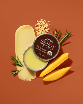 John Masters Organics Hair Pomade texture swatch reveals rich, organic styling smoothness.