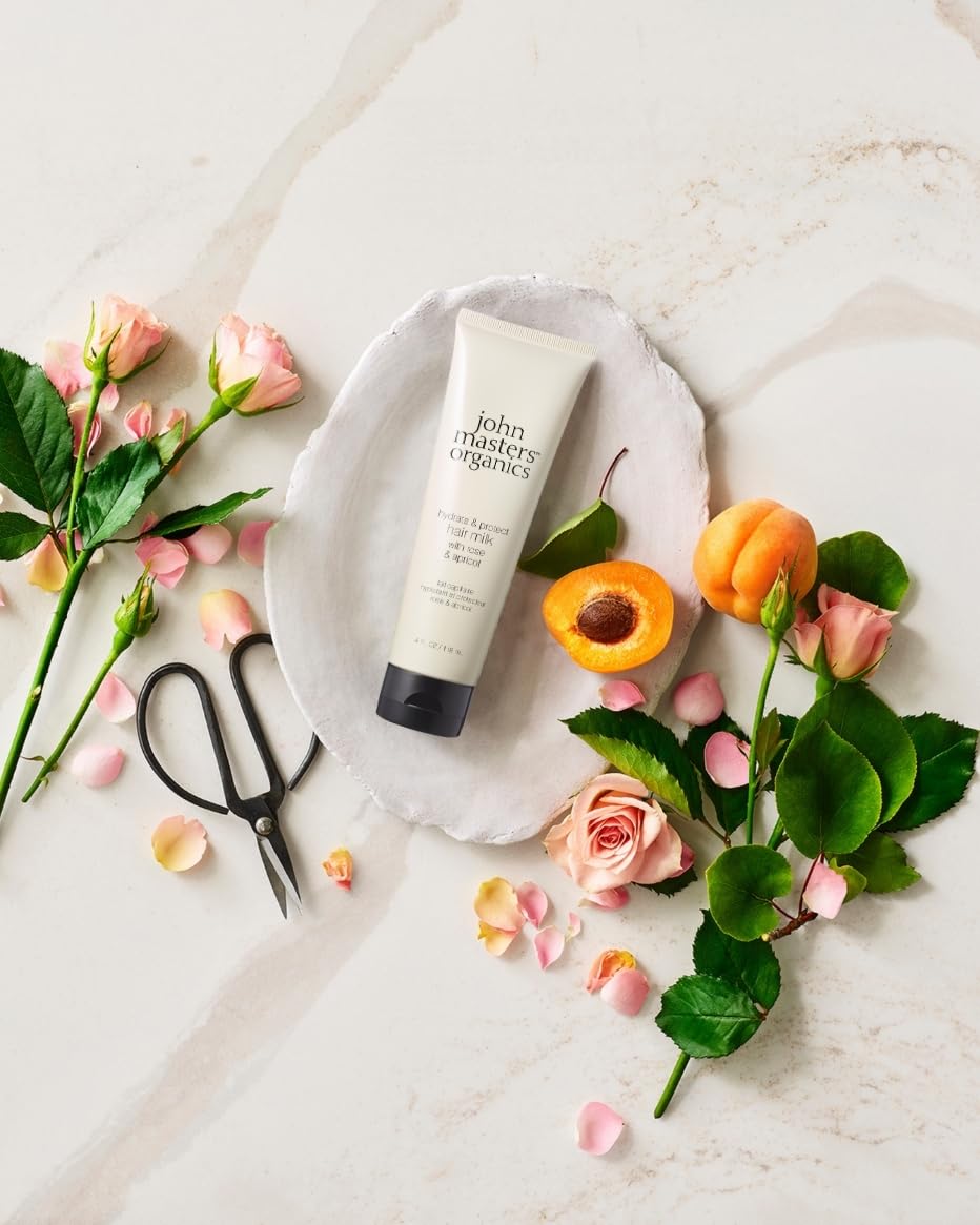 John Masters Organics rose-water bottle close-up showing softening hair aroma
