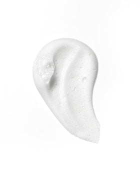 Close-up of foam texture showing creamy, flexible hold by John Masters Organics