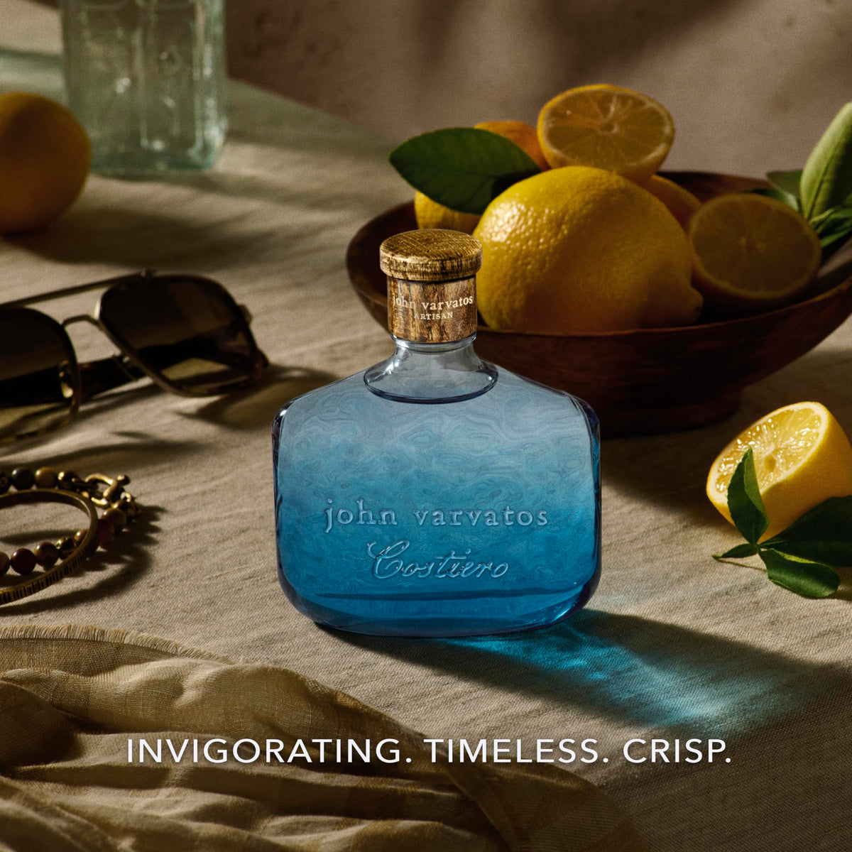 Crisp citrus notes glow in Artisan Costiero bottle for daytime freshness