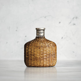 John Varvatos Artisan hand-woven flask bottle for a luxurious feel.