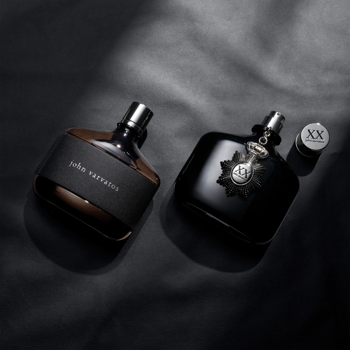 Leather-wrapped flask-style bottle emphasizing tactile luxury and fashion-inspired design