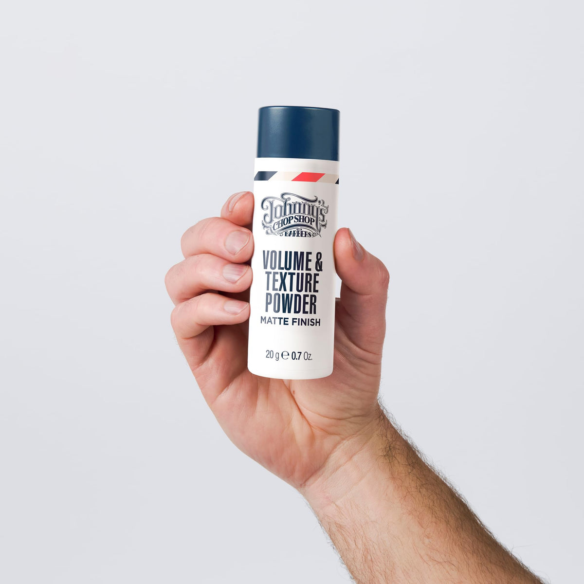 Johnny's Chop Shop travel-size powder for on-the-go styling.