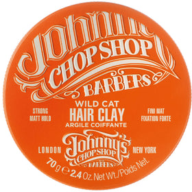 Johnny's Chop Shop Wild Cat Hair Clay packaging highlights barber-style design for easy grip