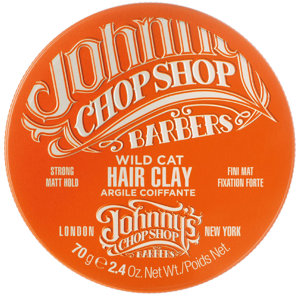 Johnny's Chop Shop Wild Cat Hair Clay packaging highlights barber-style design for easy grip