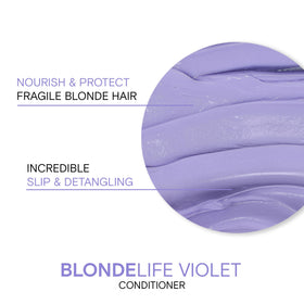 Cream-texture close-up of Joico Violet Conditioner showing slip for detangling